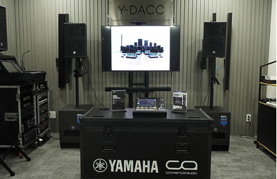 Ho Chi Minh City training facility with digital mixing console, display screen, and loudspeakers.