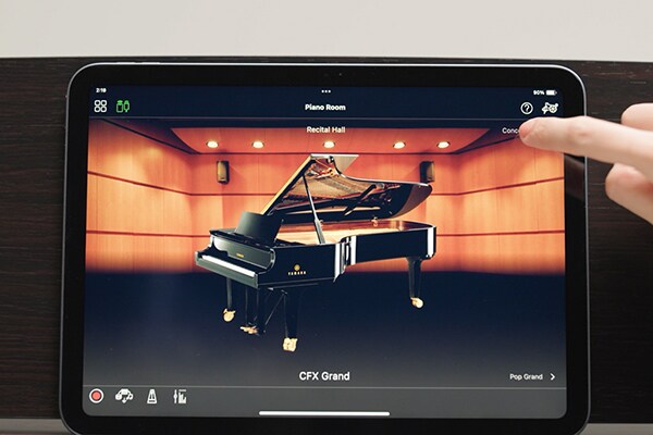 Ein Tablet-Bildschirm, auf dem die Smart Pianist App verwendet wird.